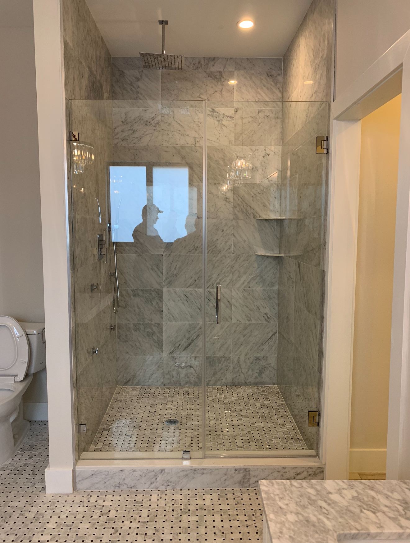 Carrara marble walk-in shower