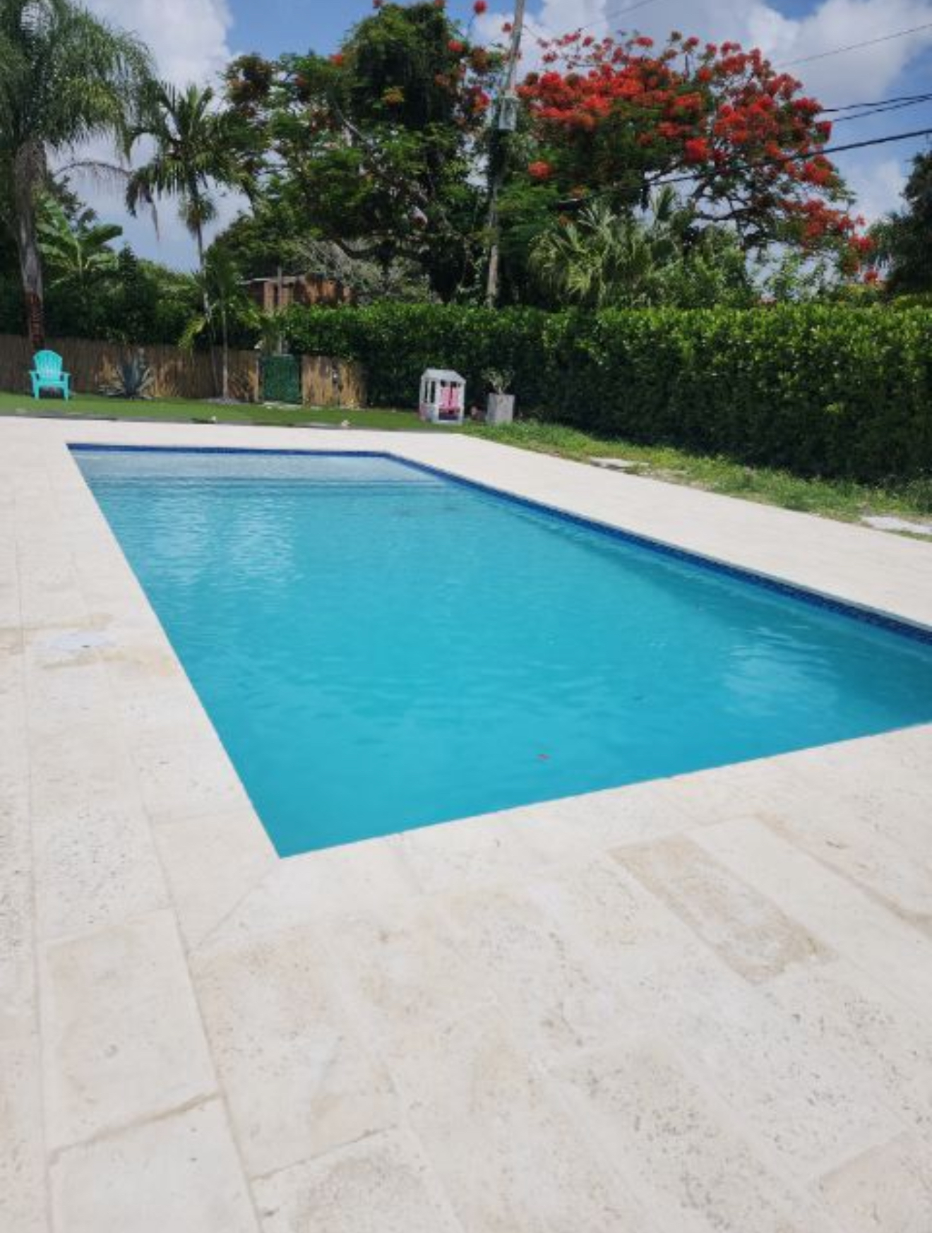 Rectangular pool with travertine deck
