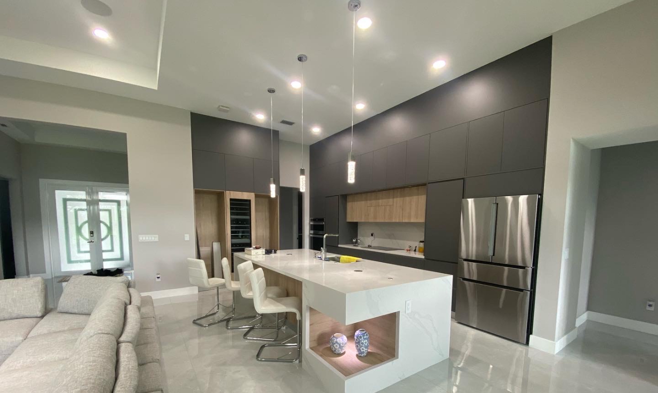 Waterfall-edge quartz island kitchen